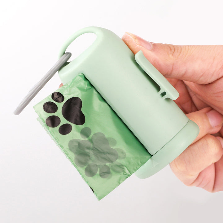 Dog waste bag dispenser with lead clip