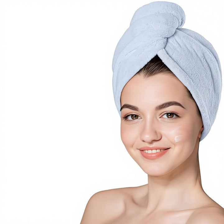 Woman wearing a light blue microfibre hair turban